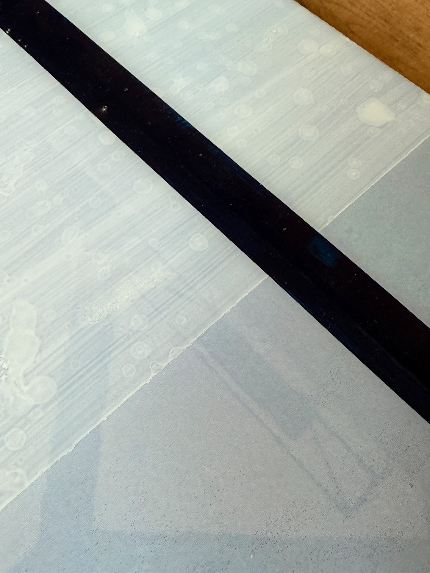 "Back view of a mixed media artwork on birchwood panel, showing the clean construction, subtle textures, and layered resin finish. The image highlights the craftsmanship and quality of the original art piece by Christen Oatley.