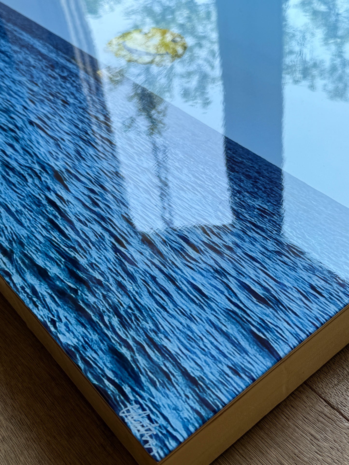 Close Up: Dream Big With Me' original landscape mixed media artwork by Christen Oatley, featuring a bright yellow smiley face parasail floating over the deep blue Mediterranean Sea beneath lime green acrylic text on a 24x48 inch Canadian birchwood panel.