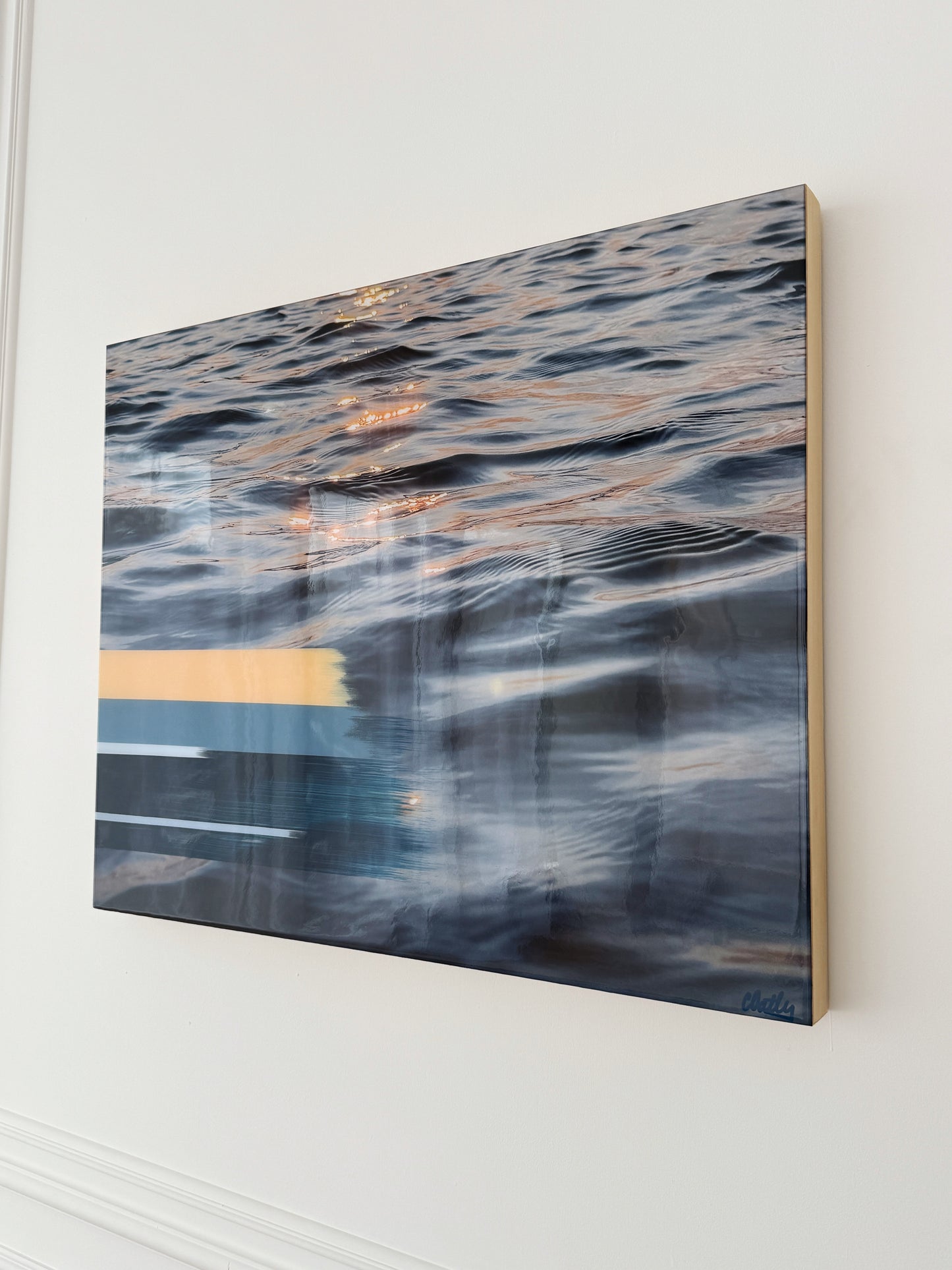 Side view of 'Sunset Tones' original mixed media artwork by Christen Oatley, mounted on a 1.5 inch deep Canadian birchwood panel, featuring Lake Joseph sunset reflections and abstract paint details, 30x24 inch resin-coated wall art.