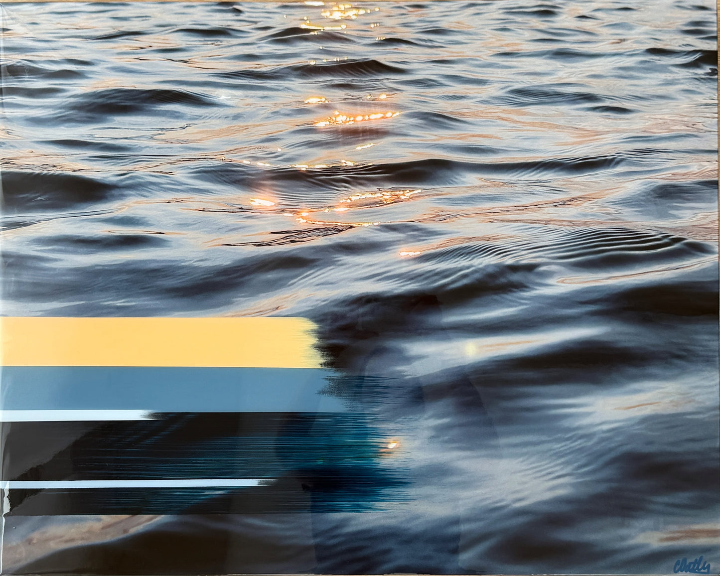 Original mixed media landscape artwork titled 'Sunset Tones' by Christen Oatley, featuring Lake Joseph at sunset with golden reflections on rippling water, layered with abstract acrylic and oil paint on Canadian birchwood panel, 30x24 inch one-of-a-kind piece finished in resin.