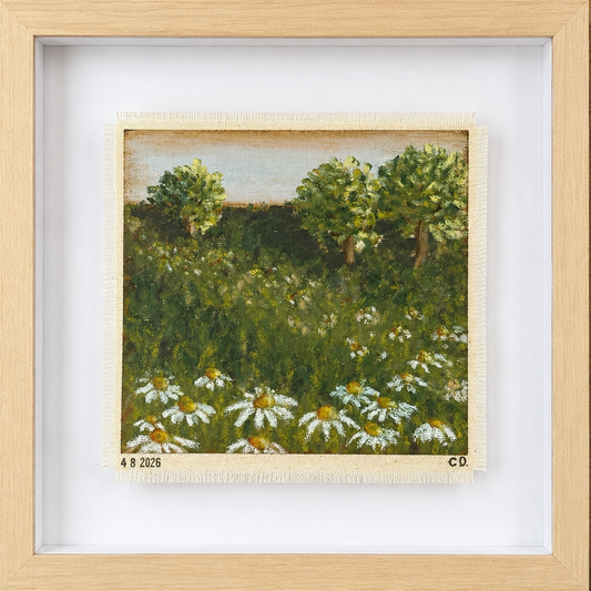 Framed painting of a landscape with trees and flowers