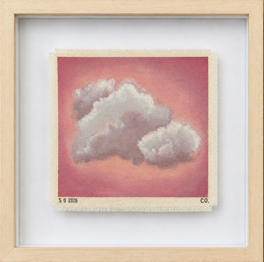 Framed artwork of clouds on a red background